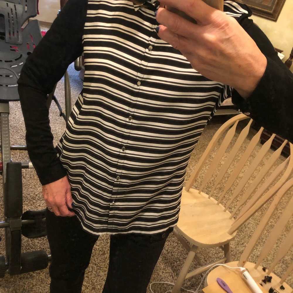 Women’s black and white top.  Size M.  Silver buttons.  Black back.